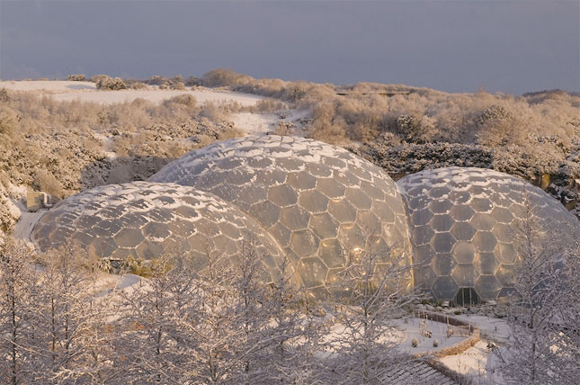 View looking down on the Eden Project biomes covered in snow