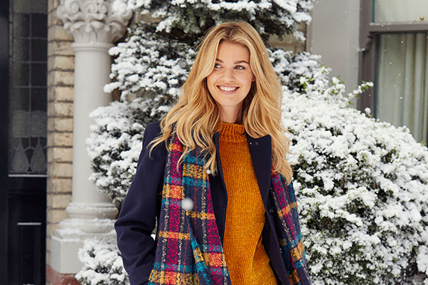 Christmas winter scene created by Snow Business for Bon Marche's winter clothing range