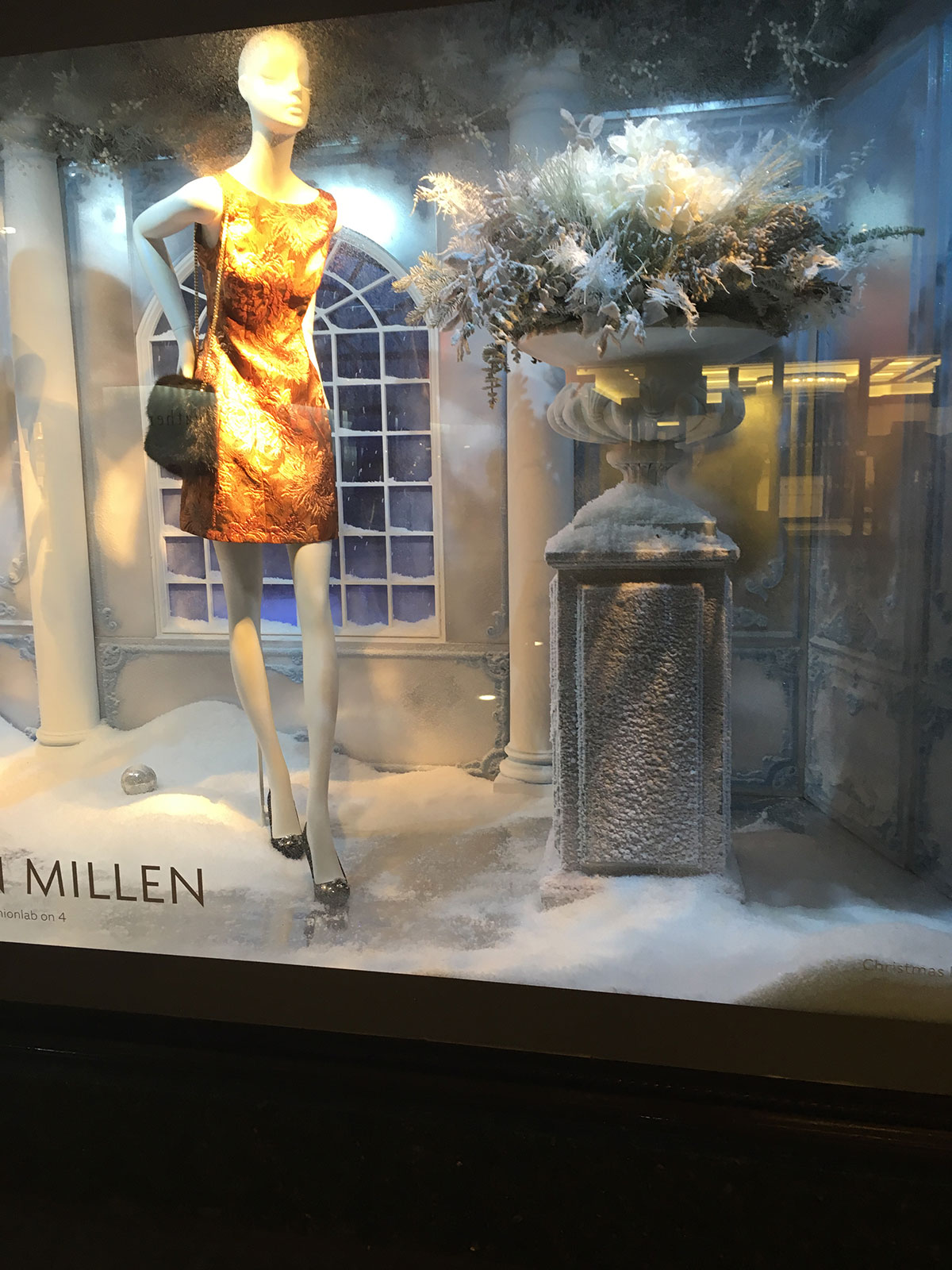 Flocking powder is used to create an icy effect for this shop window
